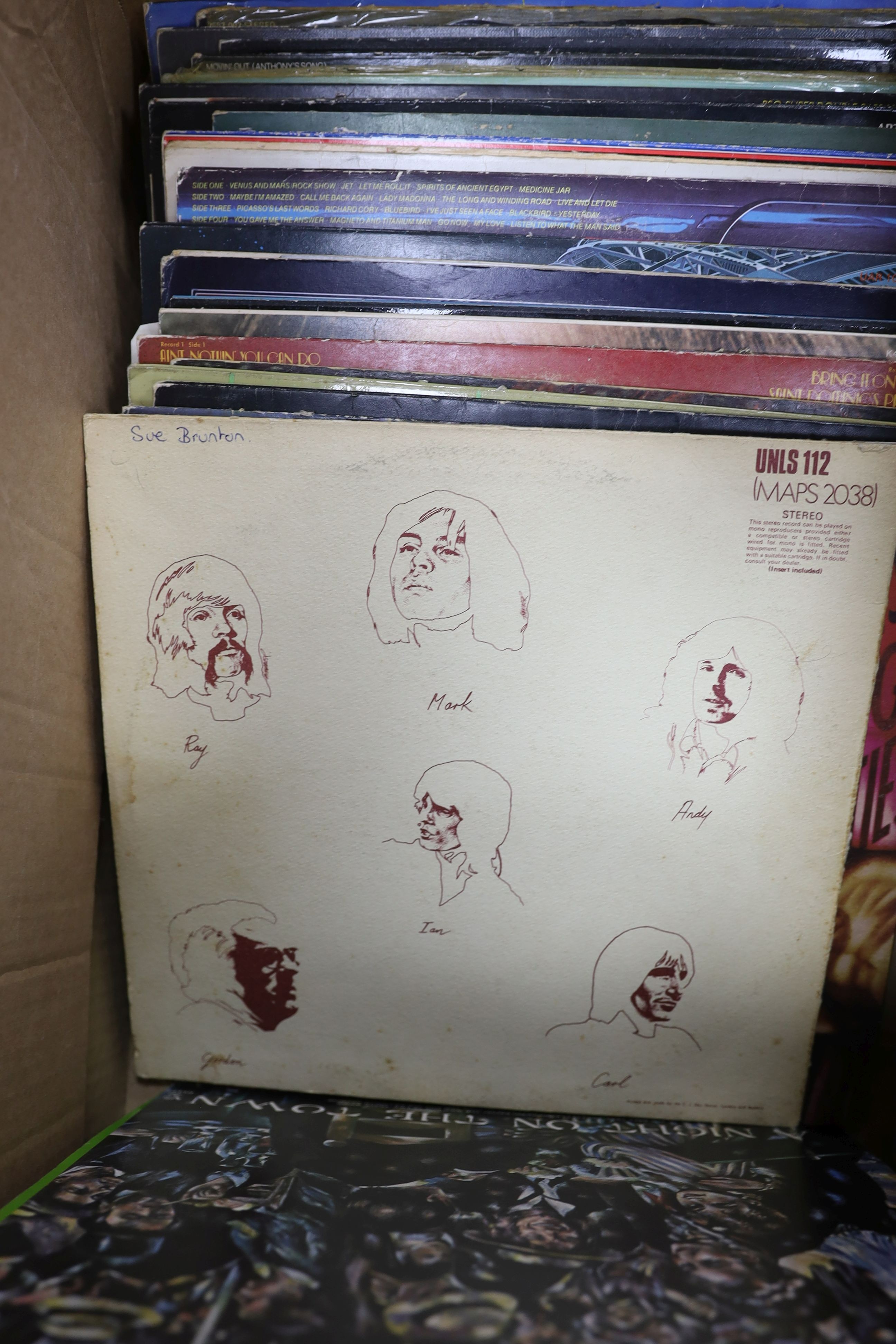 A collection of approximately 87 vinyl LPs to include The Beatles, David Bowie, Traffic, 10CC, Carly Simon etc